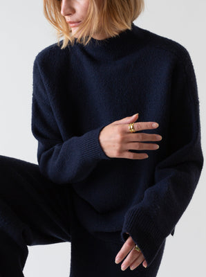 KNITTED HIGH NECK SWEATER NAVY BLUE