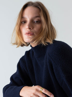 KNITTED HIGH NECK SWEATER NAVY BLUE